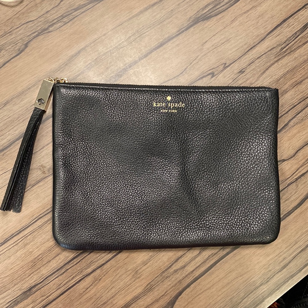 Black Kate Spade Zippered Clutch with Leather Tassel.